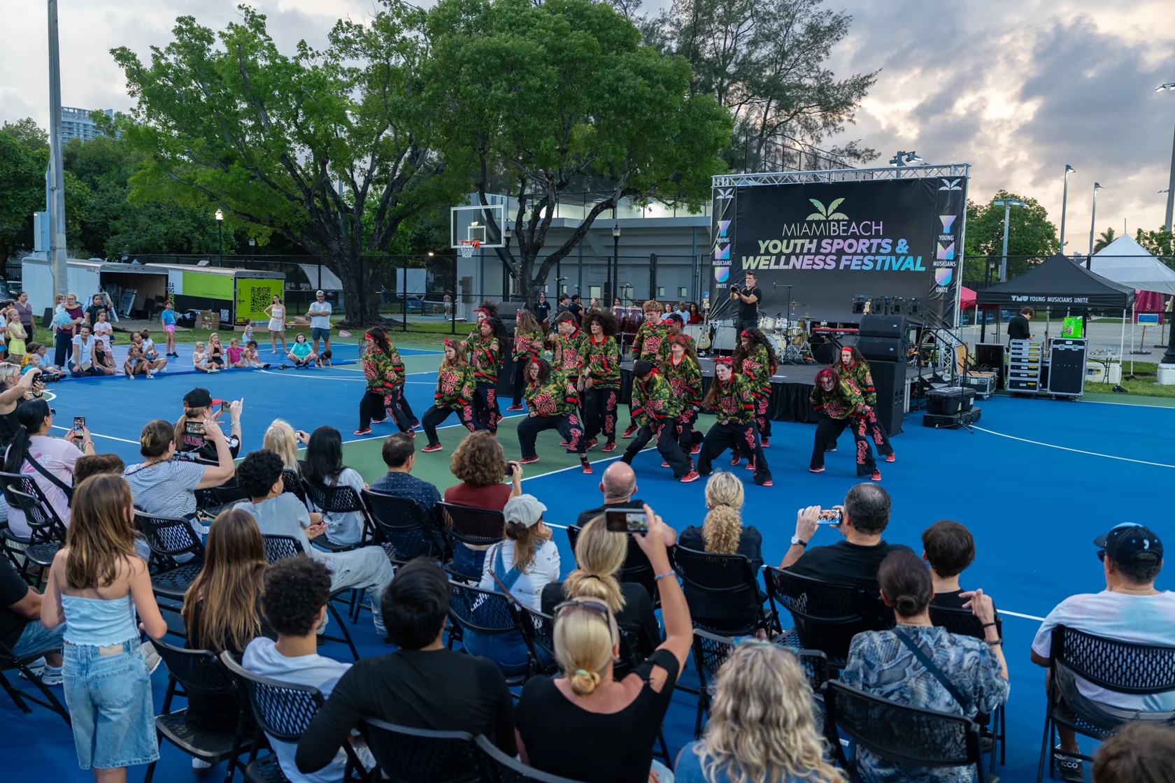 Audience and youth performers gathered at the 2026 festival opening ceremony in Flamingo Park
