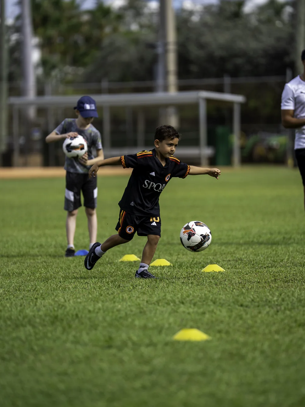 Children playing competitive soccer at the 2026 festival