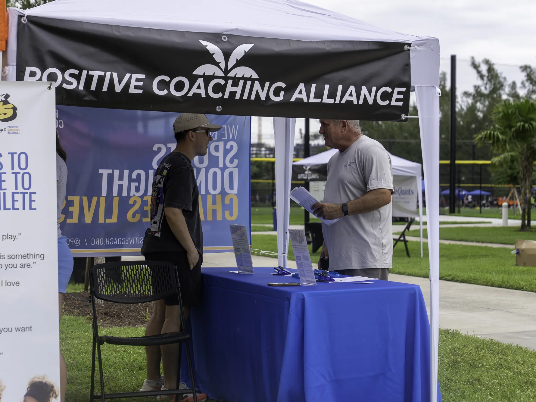 Positive Coaching Alliance information tent at the 2026 Youth Sports and Wellness Festival
