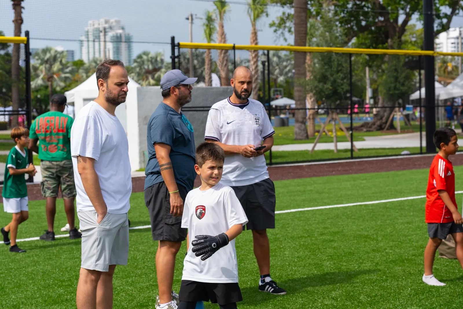 Families joining activities on the festival fields in 2026